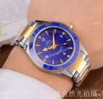 Replica Omega Seamaster 300m Spectre Watch 2-Tone Gold Blue Ceramic Bezel